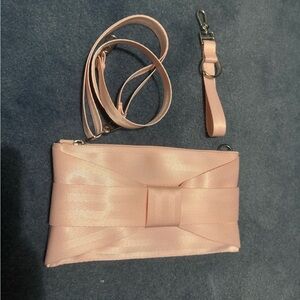 Harvey’s pink bow hip pack with CNG